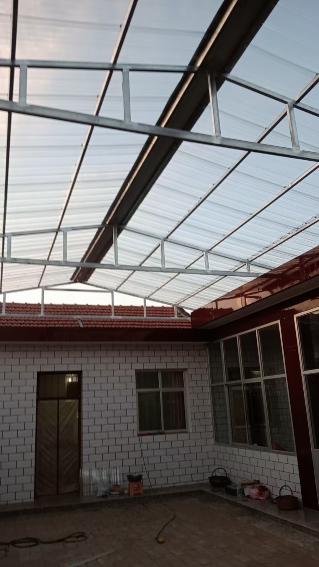 Residential Courtyard Roof Project: Corrugated Polycarbonate Sheet Application