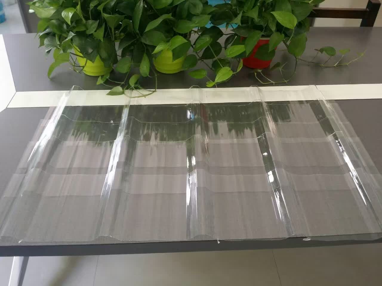 Corrugated polycarbonate sheet on table showing light transmission