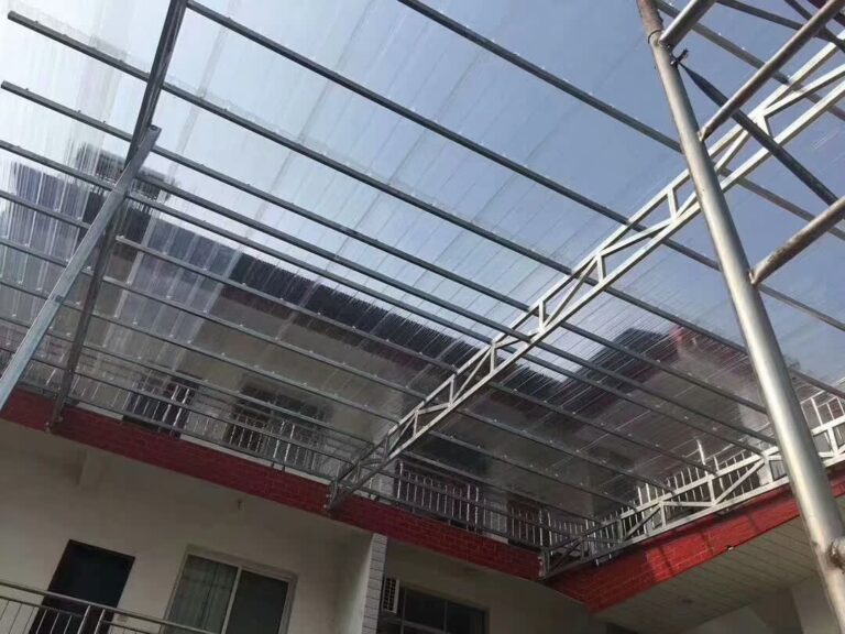 Modern carport canopy installation using corrugated polycarbonate sheets