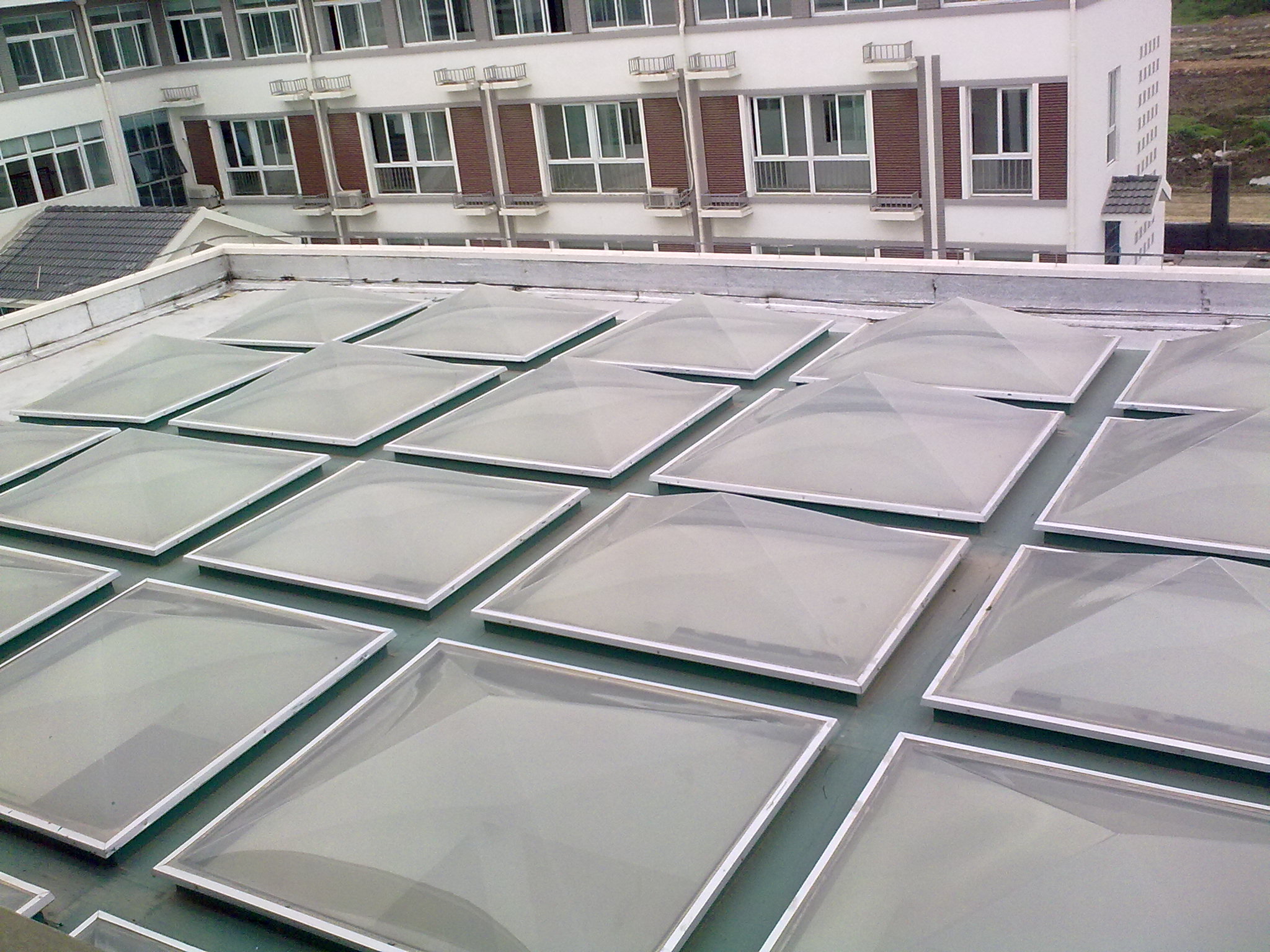 Factory skylight dome installation using PC sheets
