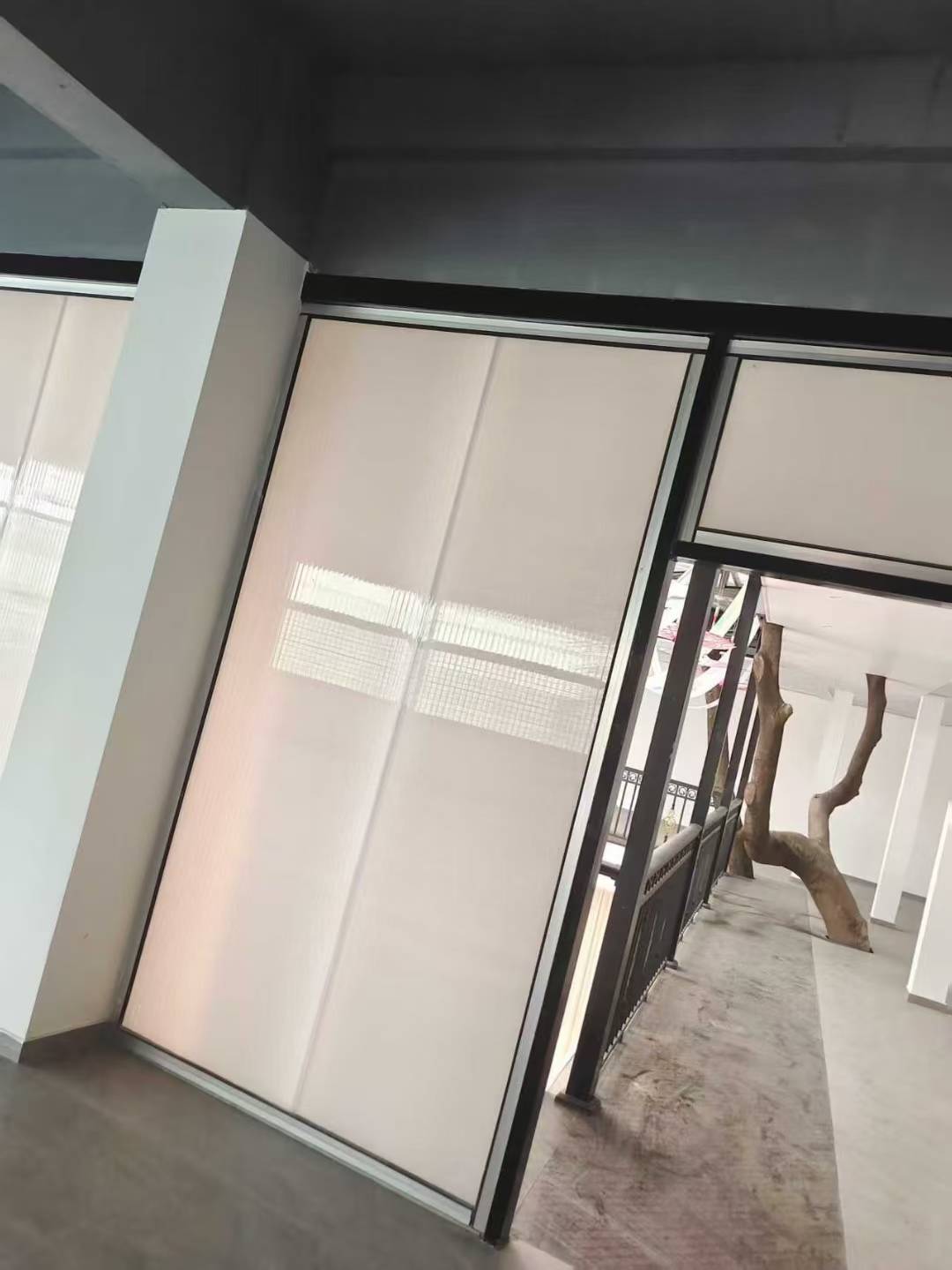 Interlocking polycarbonate panel installation detail with integrated architectural feature