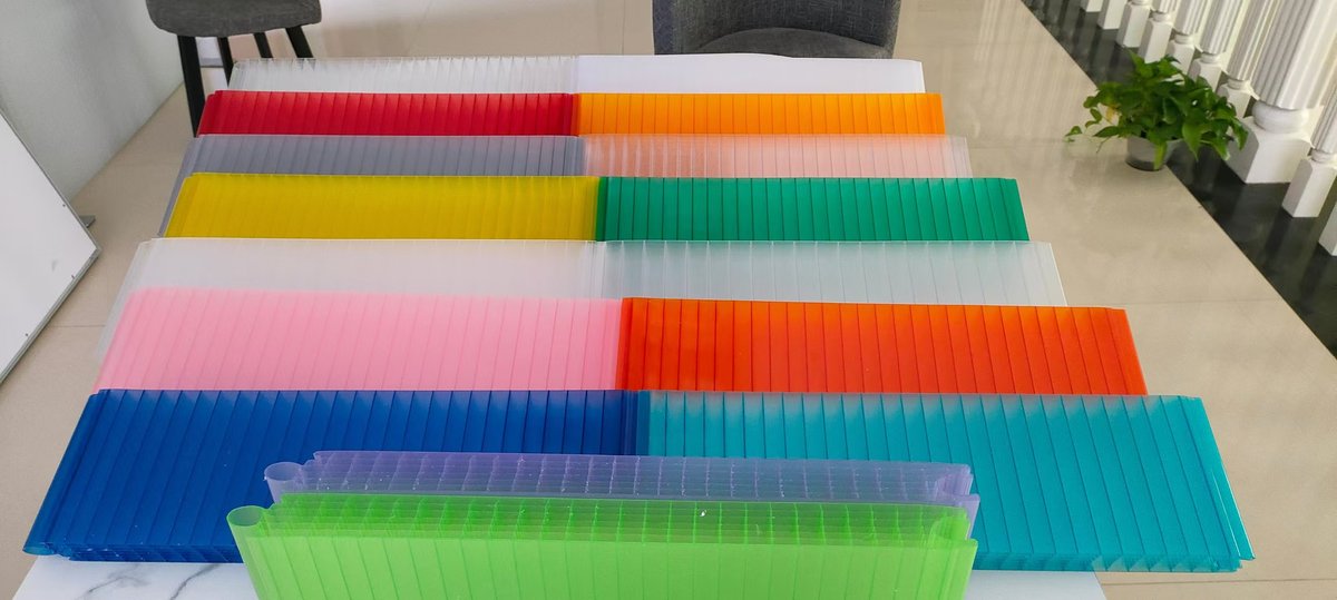 Range of interlocking polycarbonate panel colours stacked together