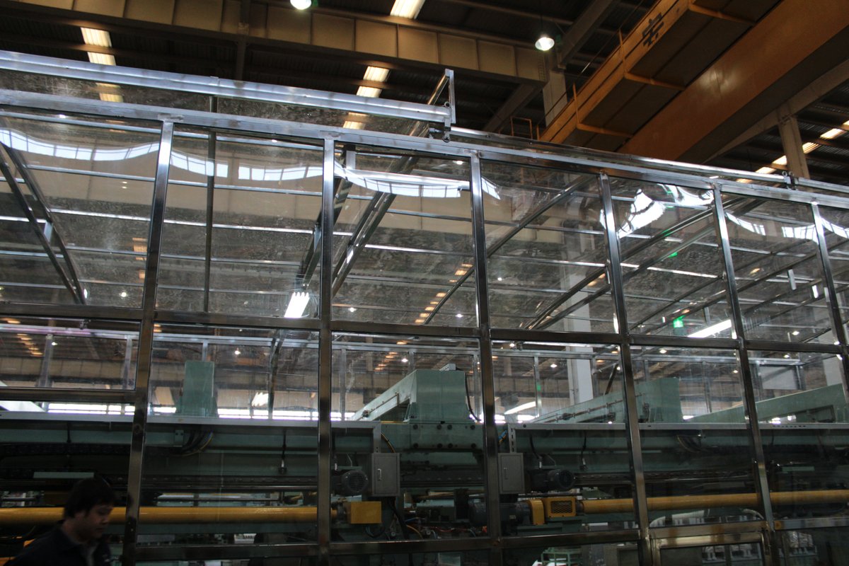 Clear solid polycarbonate machine guarding enclosure at a steel plant