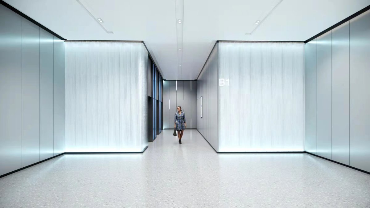 Interlocking polycarbonate panels installed as a translucent corridor wall system